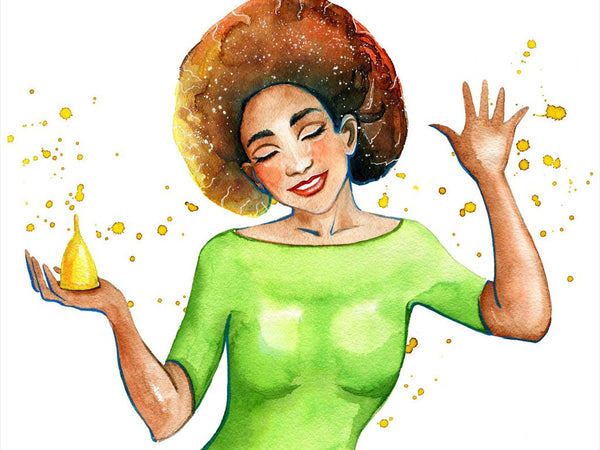 Carefree woman holding a menstrual cup